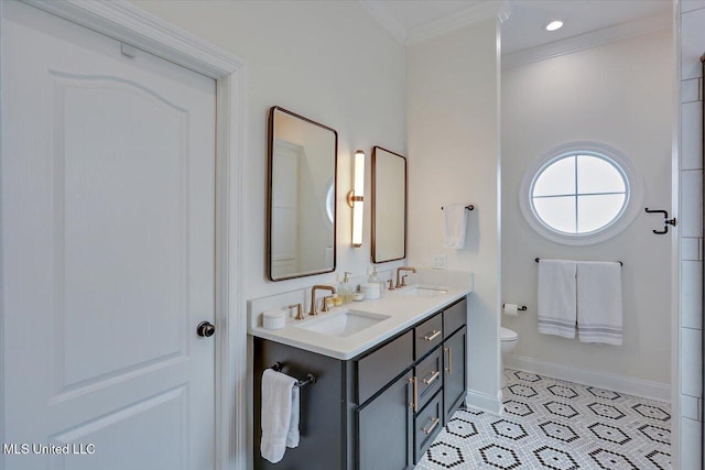 bathroom featuring toilet, vanity, tile patterned flooring, and ornamental molding