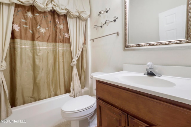 full bathroom with vanity, shower / bath combination with curtain, and toilet