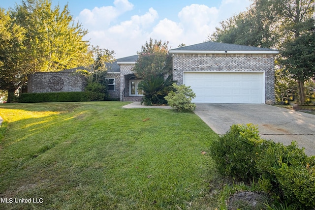 view of front of house with a garage and a front lawn