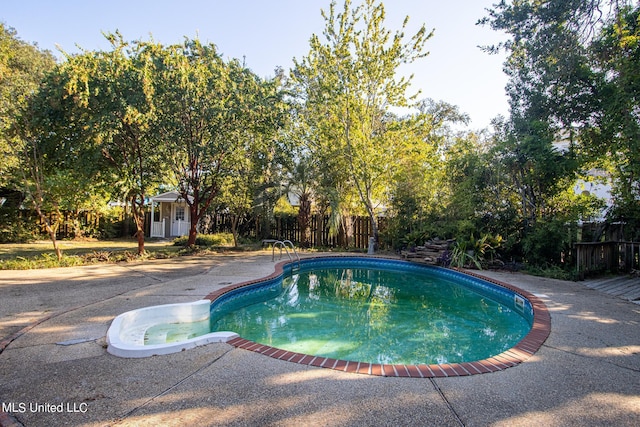 view of pool featuring a patio area