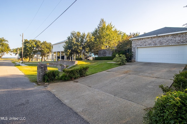 exterior space featuring a front lawn