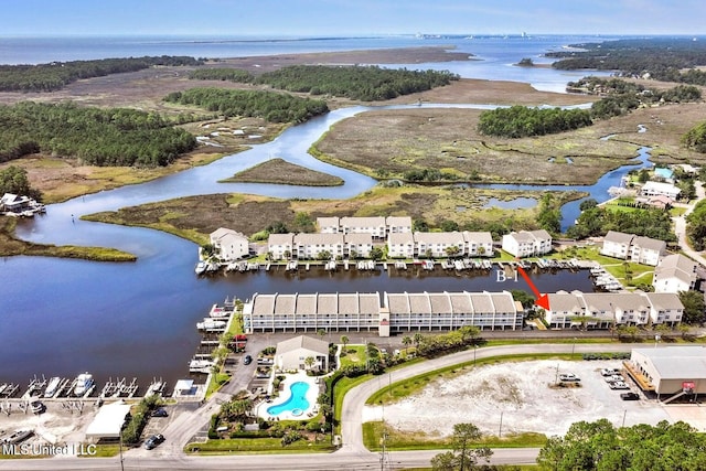 bird's eye view with a water view