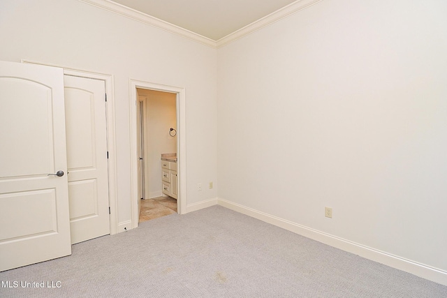 unfurnished bedroom with light carpet and ornamental molding