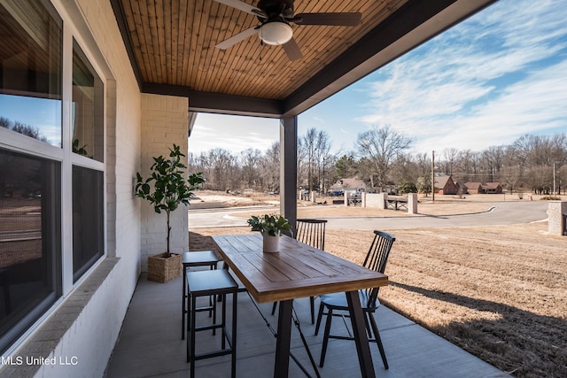 view of patio featuring ceiling fan