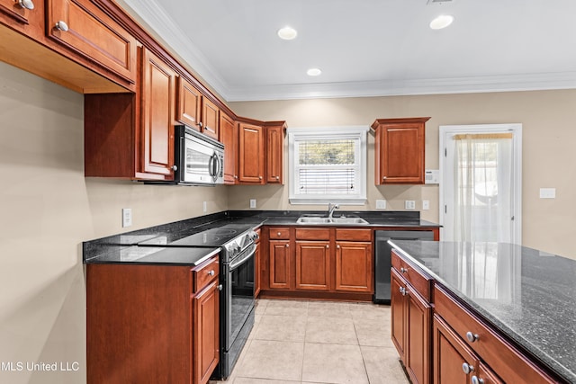 kitchen with appliances with stainless steel finishes, dark stone countertops, sink, ornamental molding, and light tile patterned floors