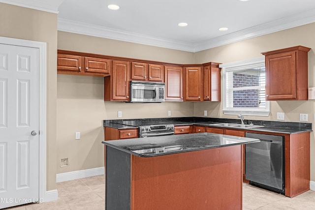 kitchen featuring a center island, light tile patterned flooring, sink, crown molding, and appliances with stainless steel finishes