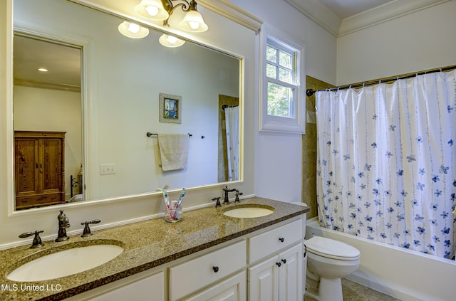 bathroom with shower / bath combo with shower curtain, toilet, a sink, and double vanity