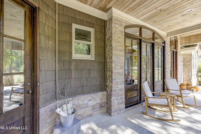 view of patio featuring a porch
