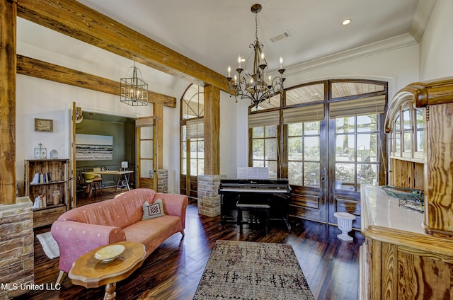 living area featuring wood finished floors, visible vents, recessed lighting, and a chandelier