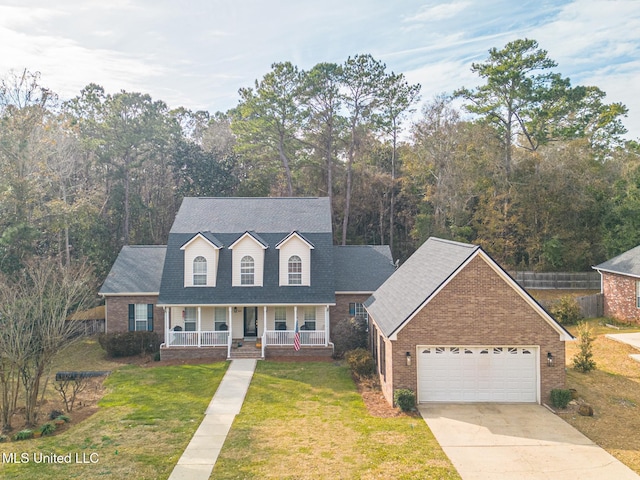 cape cod home with a garage, a front yard, and covered porch