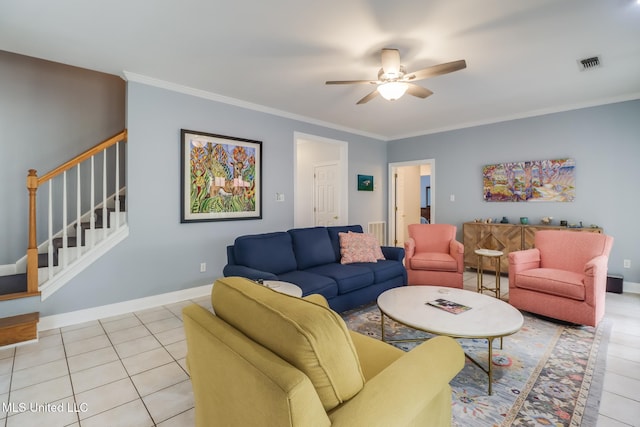 living room with light tile patterned floors, ornamental molding, and ceiling fan