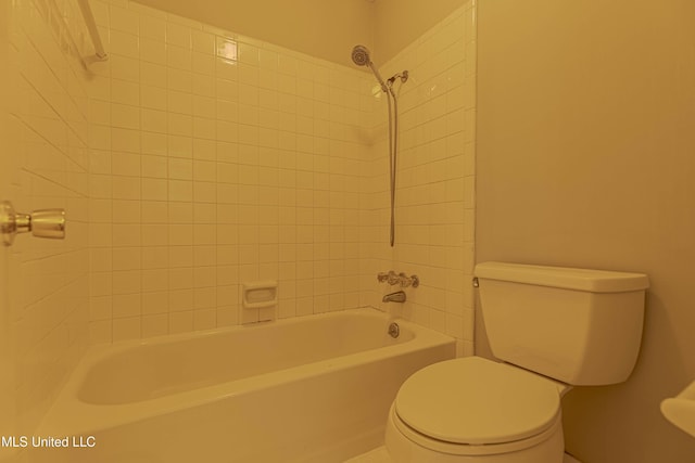 bathroom with shower / bathtub combination and toilet