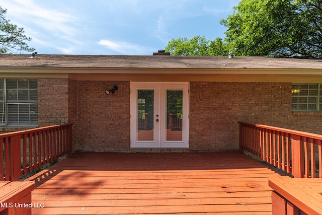 wooden deck featuring french doors