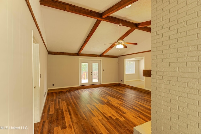 empty room with a ceiling fan, baseboards, and dark wood-type flooring
