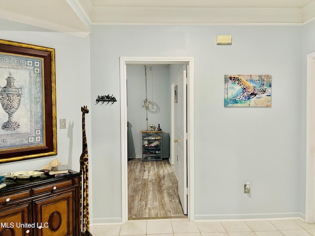 2252 Beach Dr Unit 305, Gulfport, MS 39507 - hall featuring ornamental molding, baseboards, and light tile patterned flooring