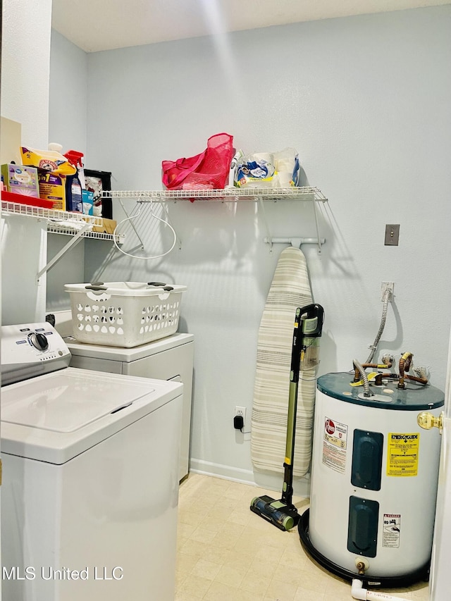 2252 Beach Dr Unit 305, Gulfport, MS 39507 - laundry room with electric water heater and washer and dryer