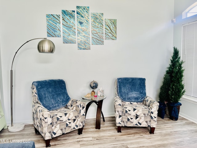 2252 Beach Dr Unit 305, Gulfport, MS 39507 - living area featuring wood finished floors and baseboards