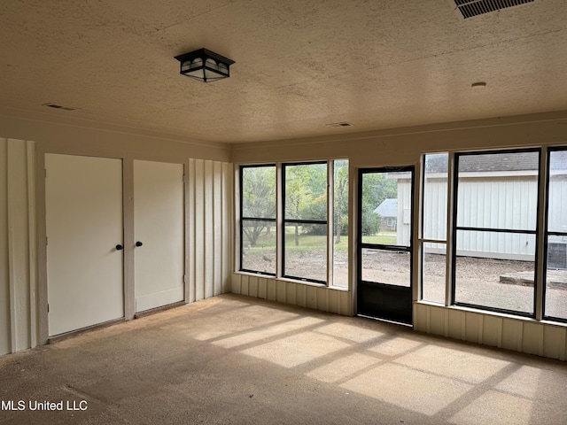 view of unfurnished sunroom