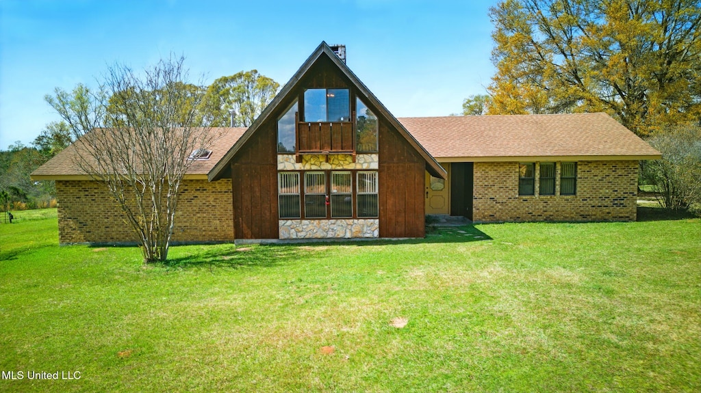 1273 Hilt Fornea Rd, Poplarville, MS 39470 - view of front of home with stone siding and a front lawn