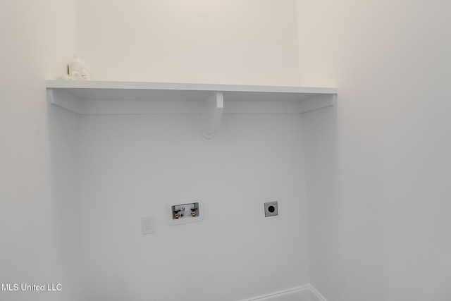 laundry room featuring electric dryer hookup and washer hookup