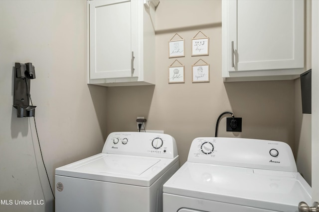 laundry room featuring cabinet space and independent washer and dryer