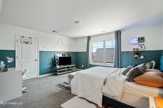 bedroom featuring visible vents and carpet floors