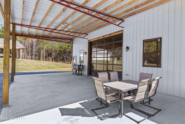 view of patio featuring outdoor dining area