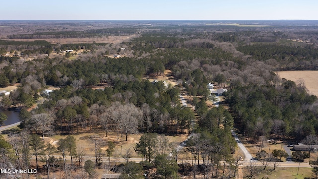 bird's eye view featuring a view of trees