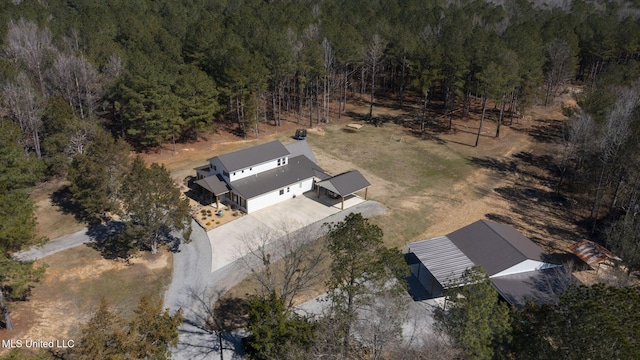 bird's eye view with a forest view