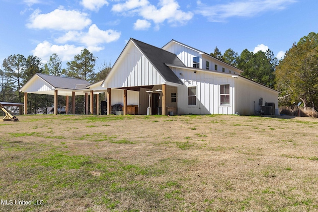 exterior space with central AC and board and batten siding