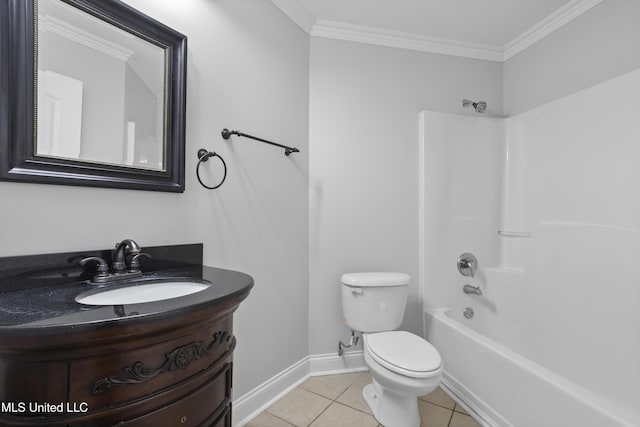 bathroom with tile patterned flooring, toilet, vanity, baseboards, and ornamental molding