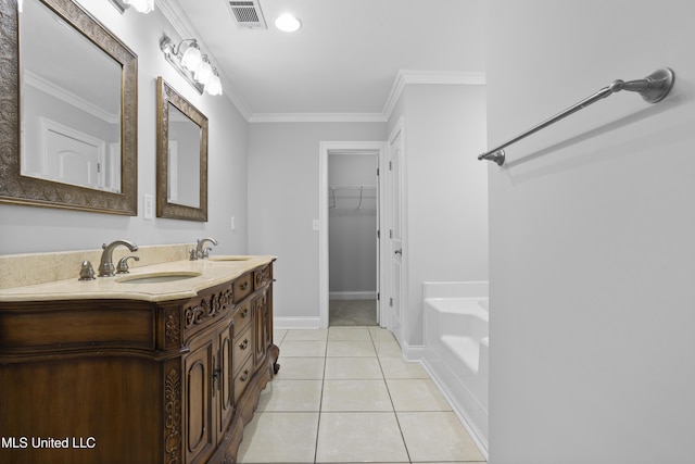 full bathroom featuring visible vents, ornamental molding, a sink, and tile patterned floors