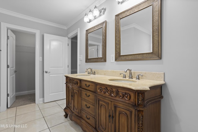 full bath with double vanity, tile patterned flooring, crown molding, and a sink