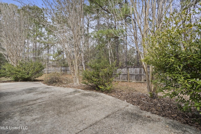 view of yard with fence