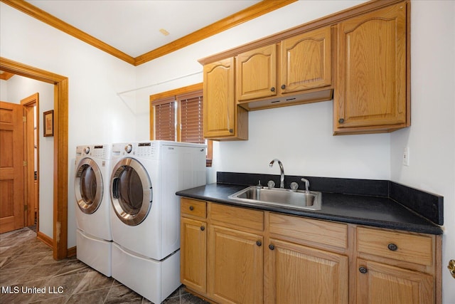 4872 Bobo Pl, Olive Branch, MS 38654 - laundry room featuring washer and clothes dryer, cabinet space, and crown molding