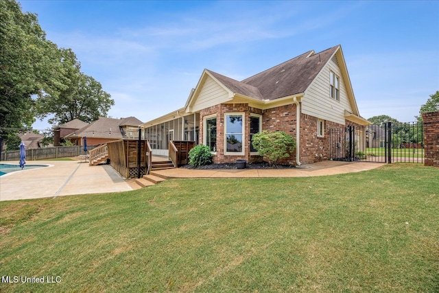 4872 Bobo Pl, Olive Branch, MS 38654 - view of front of property with brick siding, a patio, a wooden deck, a gate, and roof with shingles