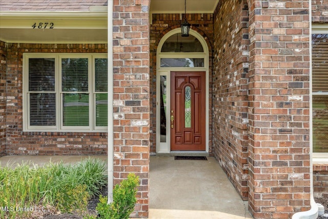 4872 Bobo Pl, Olive Branch, MS 38654 - view of exterior entry featuring brick siding