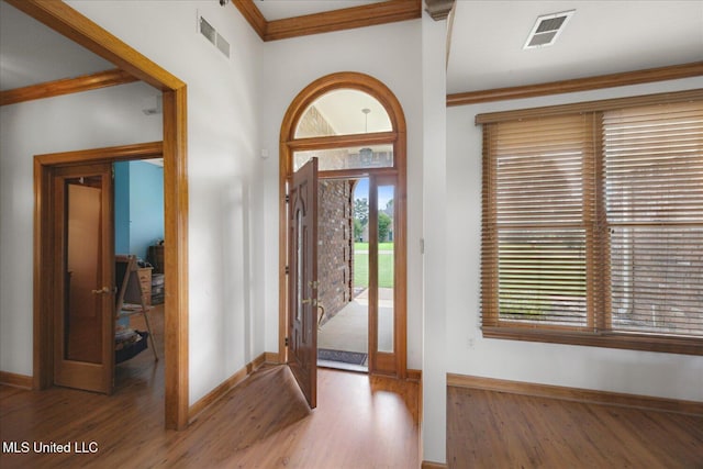 4872 Bobo Pl, Olive Branch, MS 38654 - entrance foyer featuring wood finished floors, ornamental molding, and baseboards
