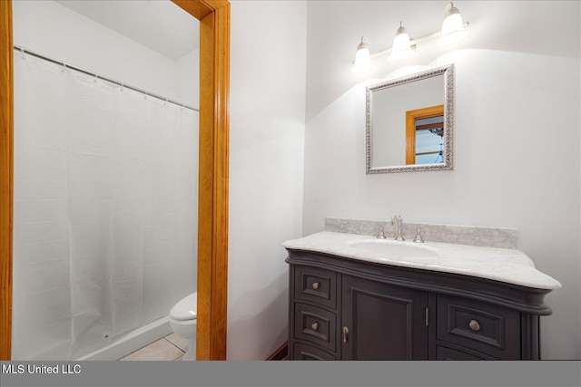 4872 Bobo Pl, Olive Branch, MS 38654 - full bathroom with vanity, toilet, a shower with shower curtain, and tile patterned flooring