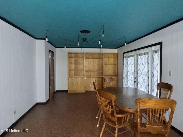 305 N Heard St, Senatobia, MS 38668 - dining space featuring ornamental molding