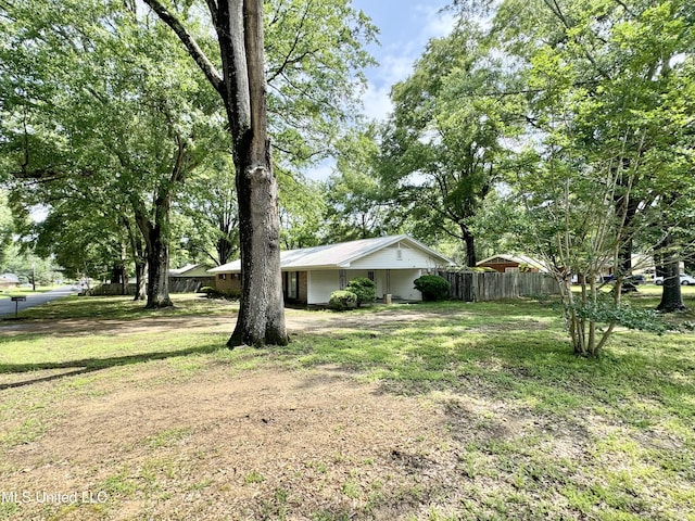 305 N Heard St, Senatobia, MS 38668 - view of yard with dirt driveway