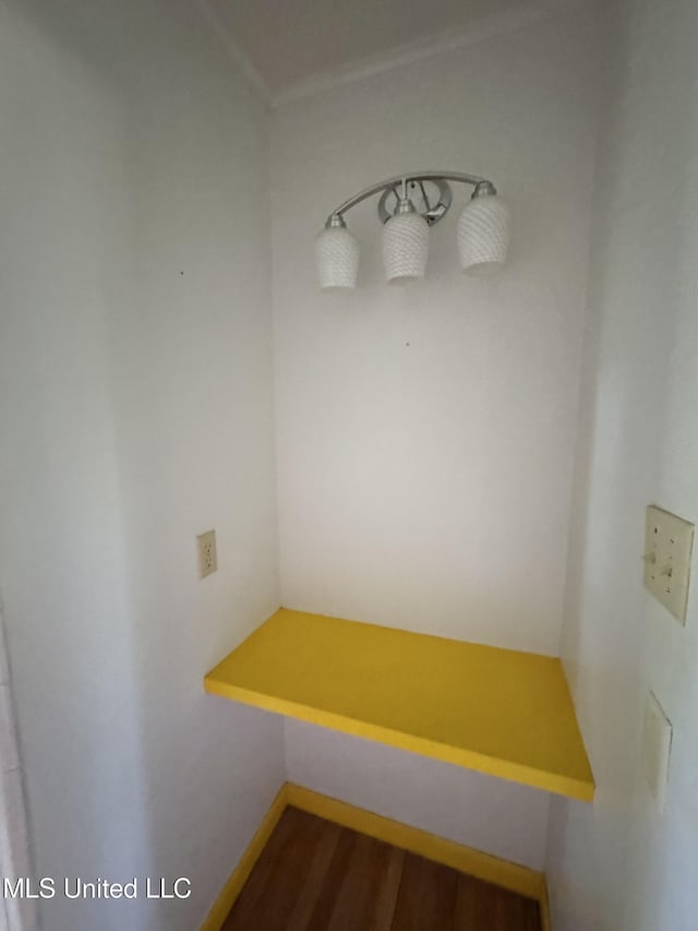 305 N Heard St, Senatobia, MS 38668 - detailed view of wood finished floors and ornamental molding
