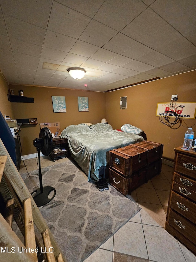 bedroom featuring light tile patterned floors