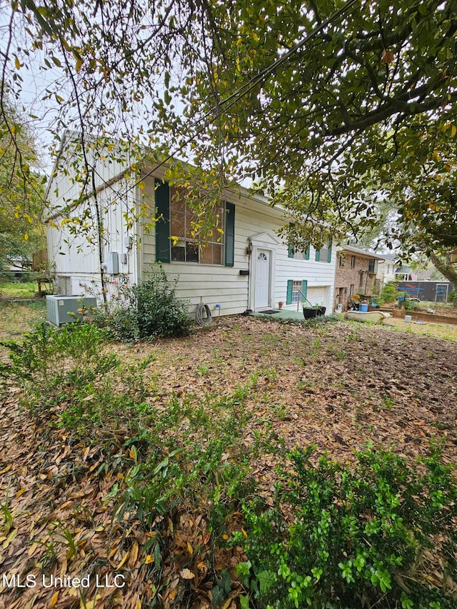 view of front of home with central AC