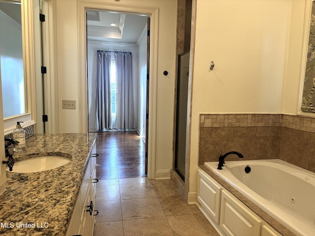 bathroom with hardwood / wood-style flooring, vanity, independent shower and bath, and crown molding