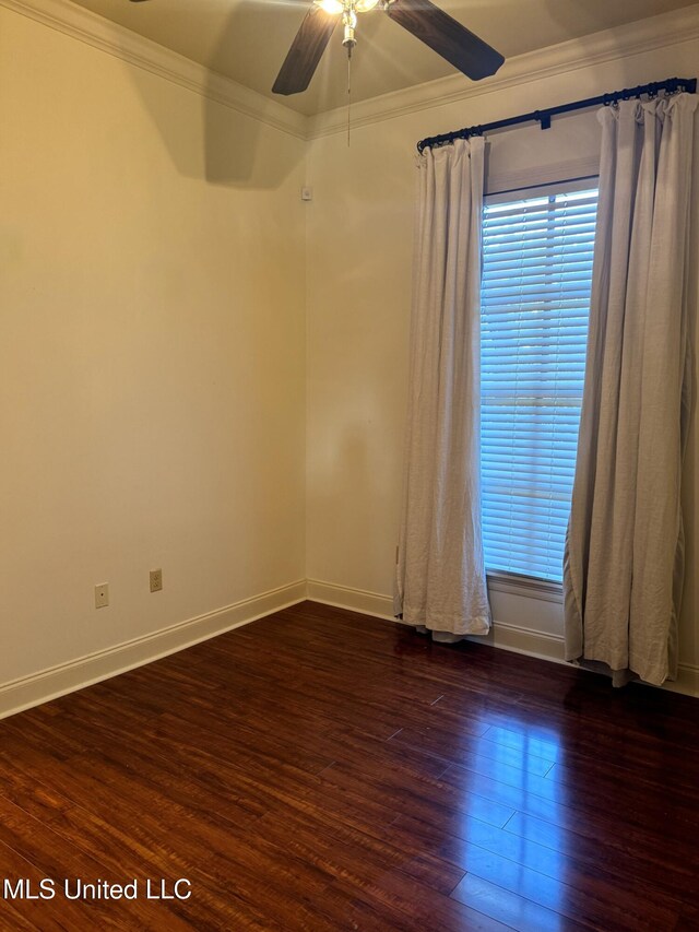 unfurnished room with ceiling fan, crown molding, and dark hardwood / wood-style flooring