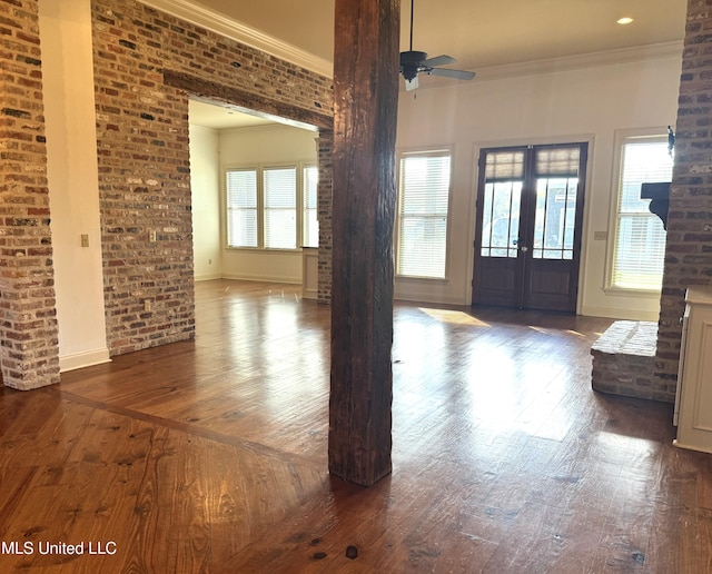 entrance foyer featuring french doors, hardwood / wood-style floors, a healthy amount of sunlight, and ceiling fan