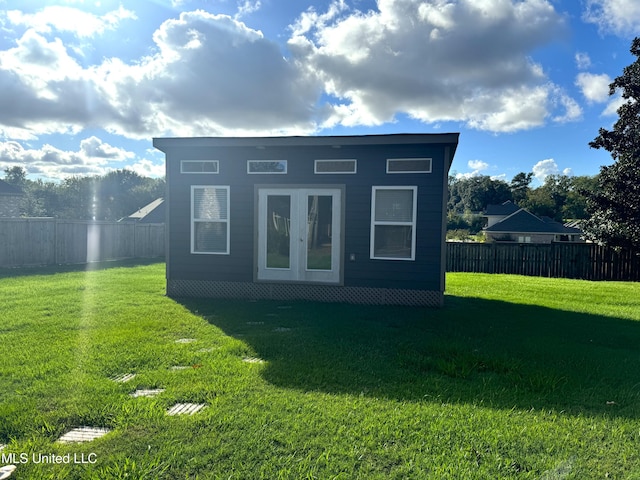 view of outdoor structure with a yard