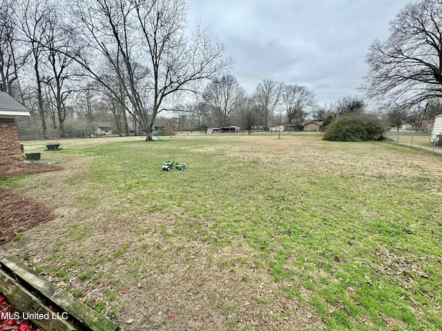 view of yard featuring fence