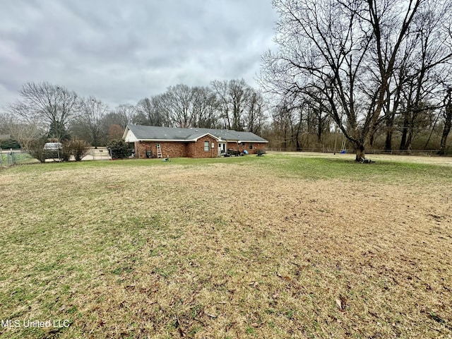 view of yard featuring fence